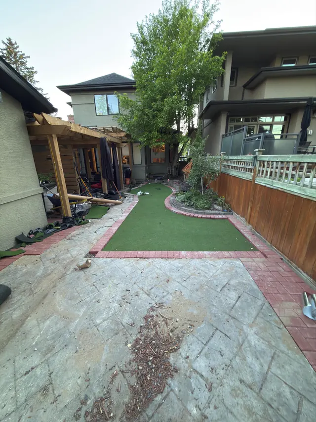 Flagstone patio and turf under construction