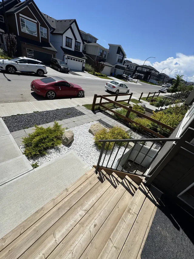 Front yard slab path and planted beds
